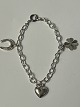 Bracelet with charms in silver.Length 15.7 cm.