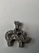 Elephant Pendant, in 14 Kt. white gold with inlaid diamonds.Height 1.7 cm.