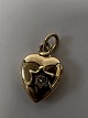 14 karat guld. Hjerte med indlagt diamant.Charms / Vedhæng.Højde 1,1 cm.
