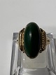 14 carat gold ladies ring with green jade.Ring size 55.