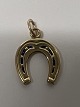 14 carat gold. Horseshoe with Blue enamel.Charms / Pendants.Height 1.7 cm.